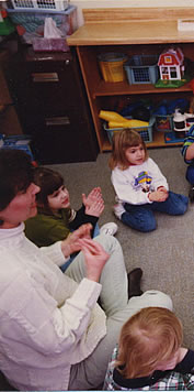 teacher and students in a preschool class