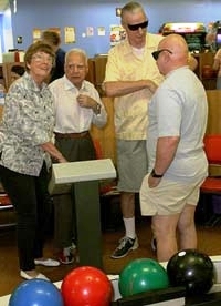 Picture of group of older culturally diverse individuals in bowling alley