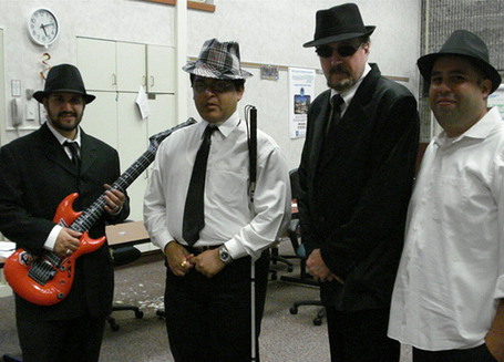 Pratik with the Blues Brothers during a student exercise