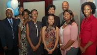 John Miller with a group of people receiving the Thorpe Mitchell Award