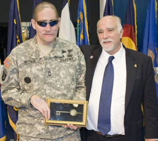 Master Sgt. Jeffrey Mittman receives a key to the city