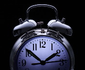 Photo of a clock face at 2:00 AM