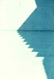 Outdoor staircase with jagged blue shadow