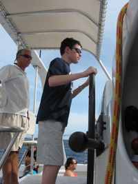 Michael's son Bob piloting a $2 million dollar catamaran!