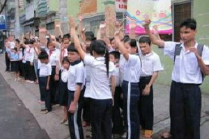 Students waving good-bye to Bach Viet's hearse
