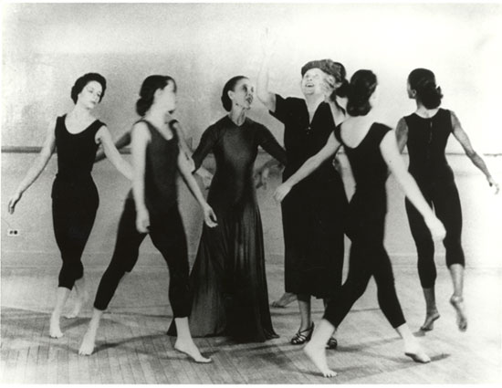 Helen Keller in Martha Graham's dance studio with Martha and dancers.