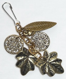 cane charm with brass leaves