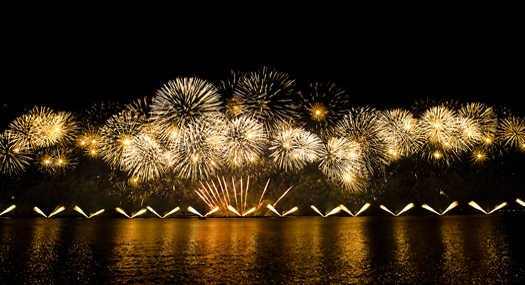 spectacular fireworks over a body of water