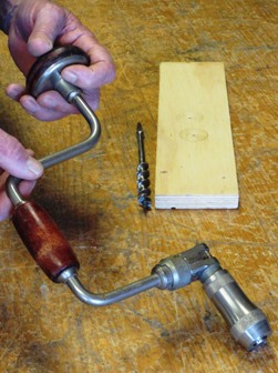 brace with chuck on one end and handle on other end