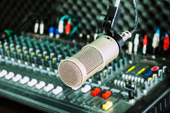 Microphone and the mixing desk sound studio background 
