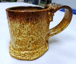Empish's beautiful new creation, a glazed ceramic mug