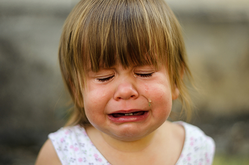 young girl crying