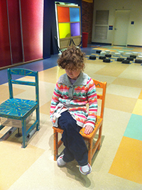 Madilyn enjoying the musical chairs at the Boston Children's Museum