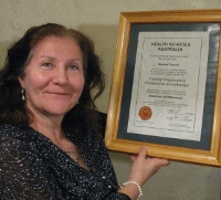 Maribel holding certificate