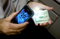 using money reader app to identify $20 bill