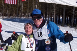 mary and her guide standing on the slopes