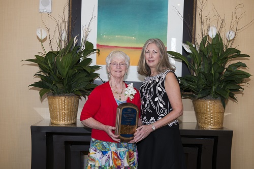Margaret receiving Allen Award from Dr. Adele Crudden