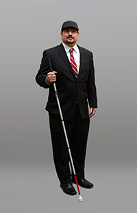 Joe Strechay, with his white cane