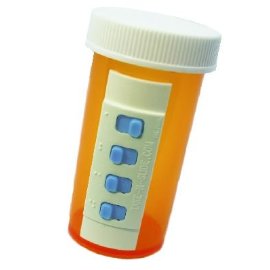 Prescription pill bottle with the Take-n-Slide attached