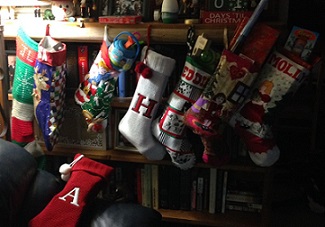 multiple stockings belonging to Eddie and cousins