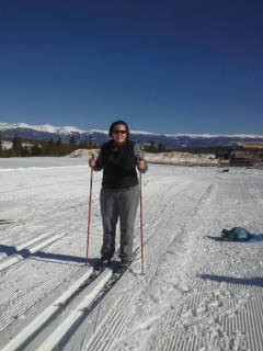 audrey on ski slope with ski poles