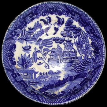 blue and white plate with willow pattern