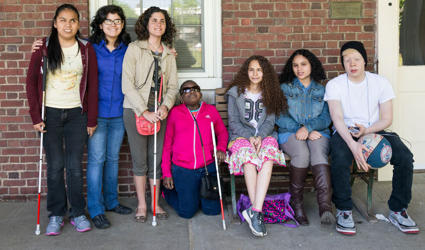 Group of teens on a bench