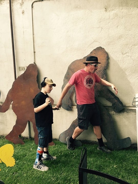 Eddie and his dad pretending to be Bigfoot