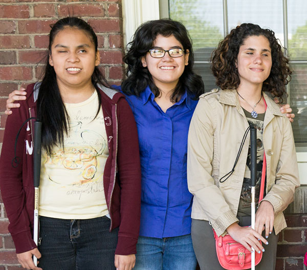 Group of young women holding canes