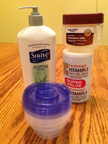 assortment of cold cream products and small plastic containers