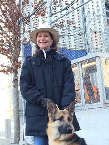 Sue Martin holding guide dog