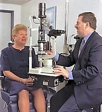 a doctor and patient during an eye exam