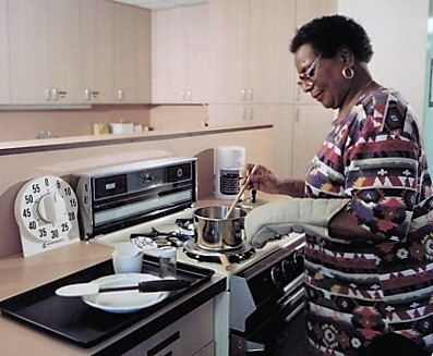 a woman cooking with adaptations