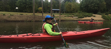 Audrey kayaking on the river at Hull Park