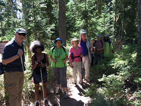 Audrey and her group hiking to the rock mound at Hull Park