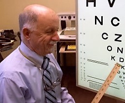 Dr. Joseph Fontenot administering a low vision visual acuity test
