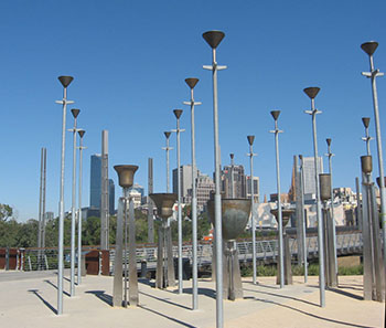 Field of Bells in Melbourne, Australia- tall narrow polls with upturned bells mounted on top