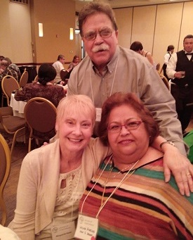 Mike Bates with Barbara Dennison on left and Wilma Hinnojas on right