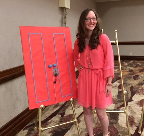 woman standing by poster