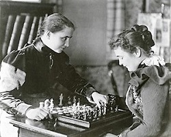 Helen Keller and Anne Sullivan playing chess