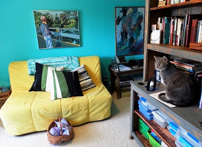 knitting nook with futon and shelving