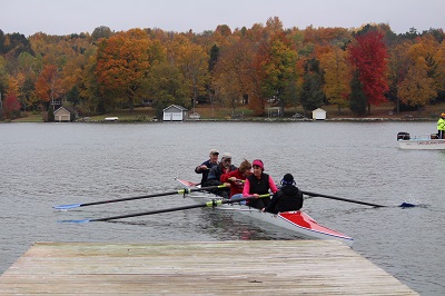 group of Traverse City support group members rowing in VIP ship