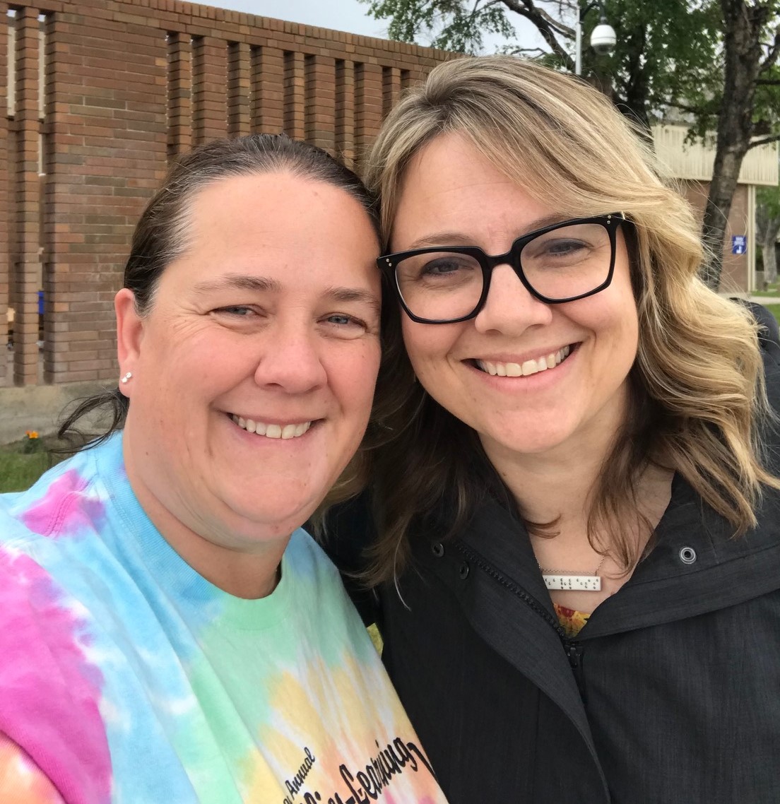 Two women smiling for the camera