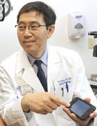 Dr. Yu-Guang He, associate professor of ophthalmology at UT Southwestern Medical Center and one of the developers of the myVisionTrack device. Photo source: UT Southwestern press release