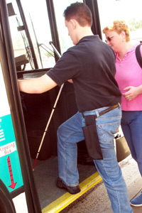 teenager getting on bus