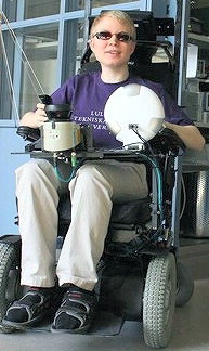 Daniel Innala Ahlmark, sitting in the prototype wheelchair, facing the camera and smiling. Credit: Lulea University