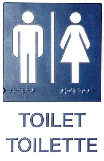 A toilet sign in French and English, with dark blue background, white male and female figure outlines, and braille