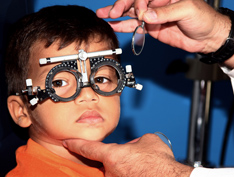 child at an eye exam