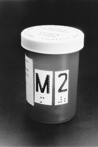 Prescription bottle with large print and braille label
