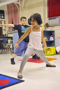 visually impaired children taking a yoga class